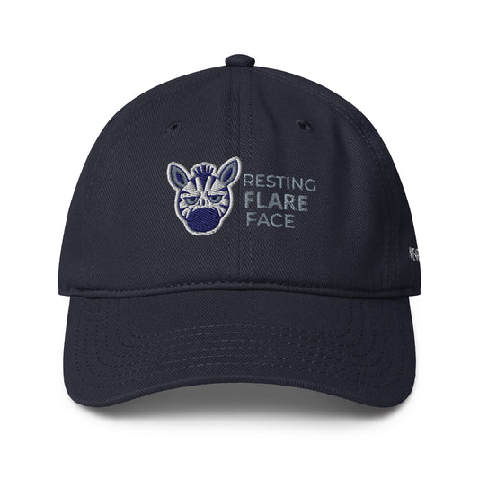 Resting Flare Face low-profile baseball cap by WearIt., featuring a bold typographic design supporting chronic illness and invisible conditions awareness.