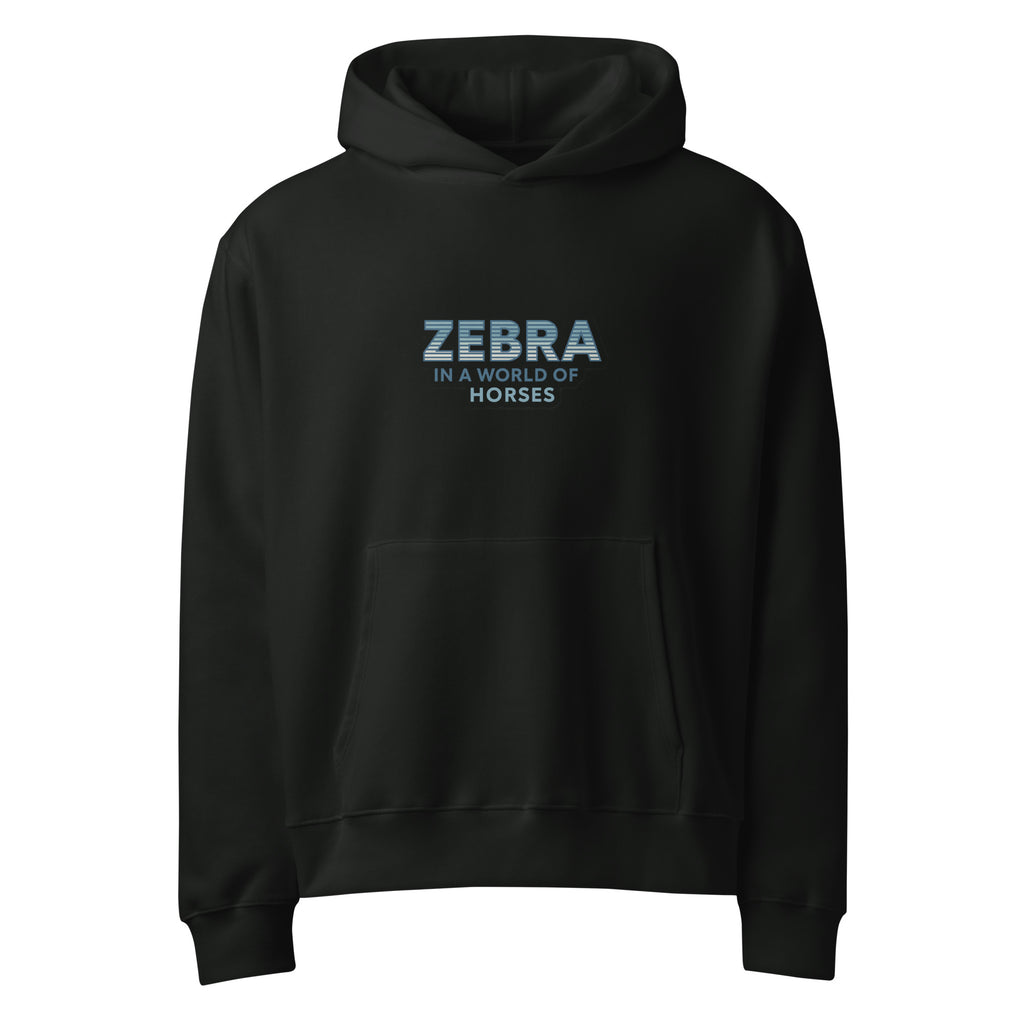 Black Hoodie with text "Zebra in a world full of horses" on a white background